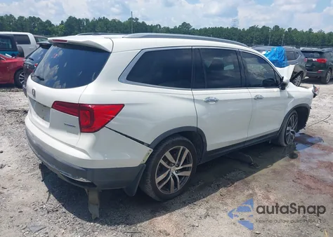 2017 Honda Pilot Touring z USA, uszkodzony, nr VIN 5FNYF5H91HB007795